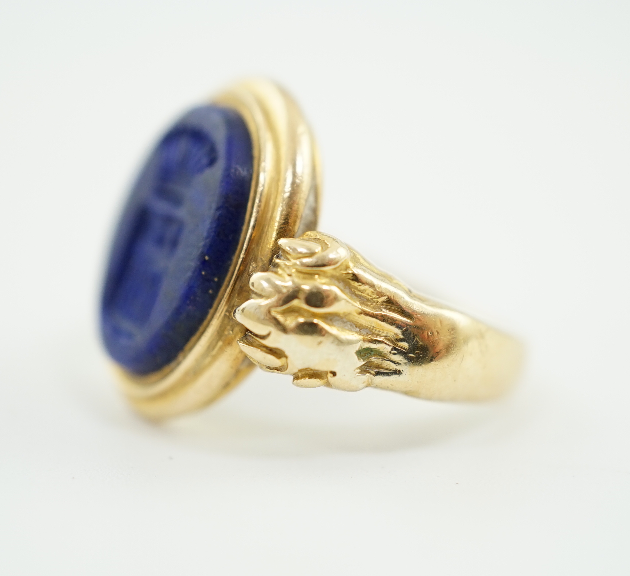 A 19th century gold and lapis lazuli set intaglio ring